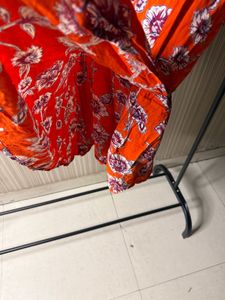 Chic Orange Floral Romper
