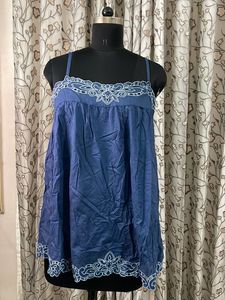 Blue Blouse with White Embroidery