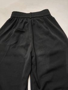 OFF DUTY BUTTON UP PLEATED HIGH WAIST PANTS