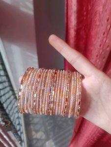 I am selling my beautiful peach bangles
