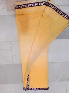 Elegant Yellow Saree with Border used only once
