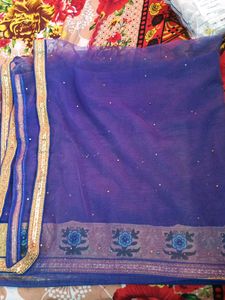 Beige Lehenga Choli with Blue Floral Embroidery