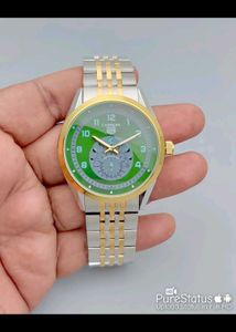 Elegant Two-Tone Watch with Green Dial