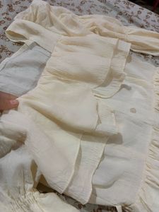 Ruffle Dress ( it has a tie in the back)