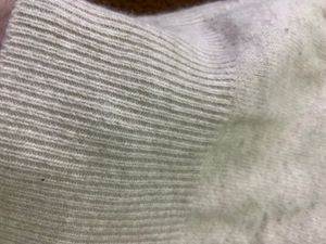 white button neckline sweater