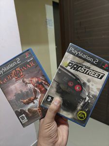 PS2 Console With 11 CD's (Non Working)