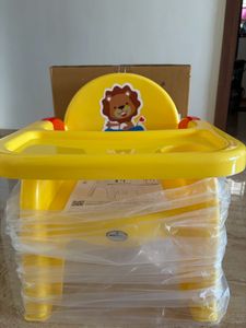 Yellow Baby High Chair with Lion Design