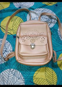 Rose Gold Cutout Mini Backpack