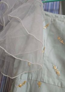 Stunning Festive Light Blue Gown with Gold Motifs