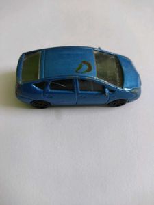 Majorette Blue Toyota Prius and Bburago Ferrari F1