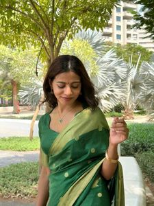 Elegant Green Saree with Gold Border