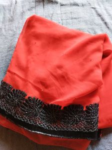 Elegent Red Saree with Black Border