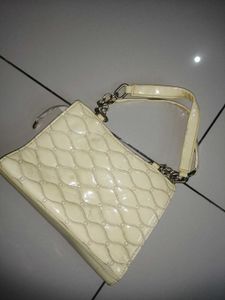 Elegant Cream Quilted Handbag