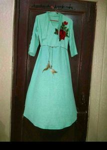 Beautiful Mint Green Gown with Floral Embroidery