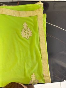 Vibrant Green Saree with Golden Border