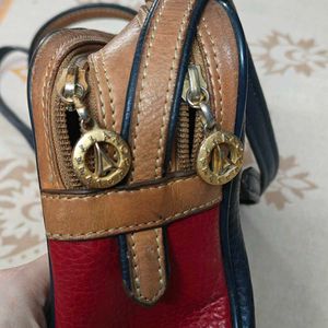 100% leather alfred snug crossbody bag