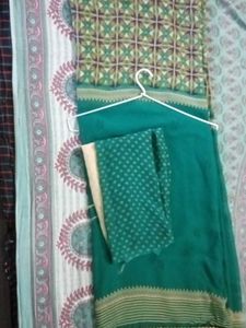 Elegant Teal saree with Intricate Print and unstit