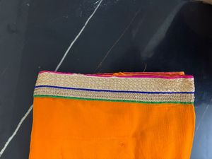 Vibrant Orange Embroidered Saree
