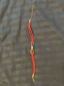 Gold Bow Bracelet With Red Straps