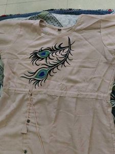 Elegant Peach Kurta with Peacock Design