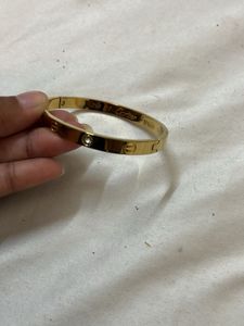 Elegant Gold Bangle with Crystals