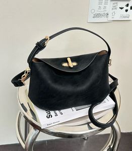 Chic Black Shoulder Bag with Gold Hardware