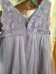 Sparkly Star Dress with Bow. colour is more bright