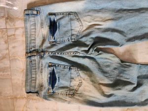 Ripped Light Wash Denim Jeans
