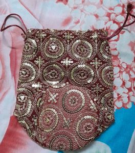 Combo Of Embroidered Sling Bag And  Zari  Potli