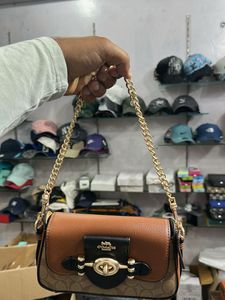 Coach Black Embossed Clutch Bag