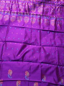 Vibrant Purple Silk Saree with Peacock Motif