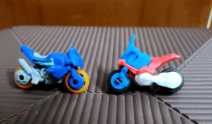 set of 2 kinder Joy bike toys