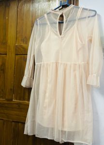 A net mini dress
