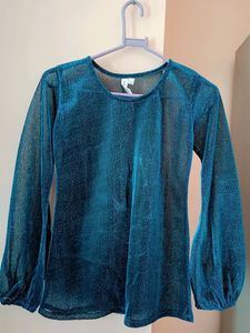 I'm Selling a Sheer Shimmer Blue Top