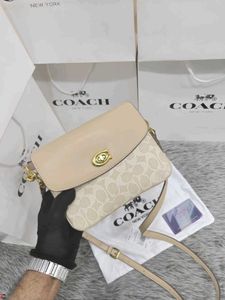 COACH*  *CASSIE CROSSBODY 19 IN SIGNATURE CANVAS*