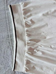 white tennis skirt