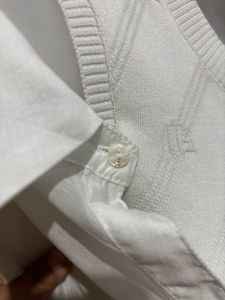 Cropped shirt with sweater vest
