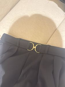 Chic Black Wide-Leg Pants with Gold Buckle