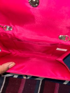 Elegant Pink Clutch with Pearl Strap