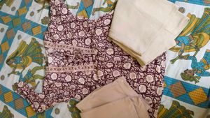 Maroon Floral short Kurta with cream Trousers