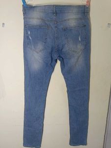 Distressed Blue Denim Jeans with top