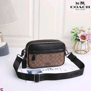 COACH* *GRAHAM CROSSBODY IN SIGNATURE CANVAS
