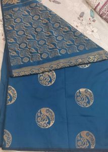 Elegant Teal Saree with Gold Motifs