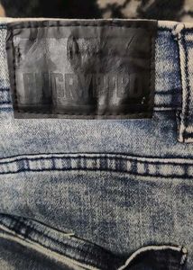 Distressed Denim Jeans