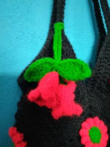 Crocheted Black Handbag with Floral Design