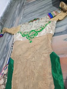 Elegant Cream Kurta with Red &amp; Green Embellishment