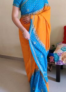 Designer Orange blue heavy work saree