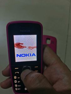 Nokia Pink Mobile Phone with Back Cover