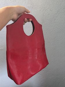 Clinique Red Handbag