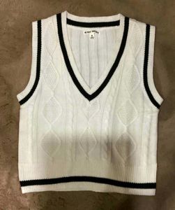 White knitted sweater vest